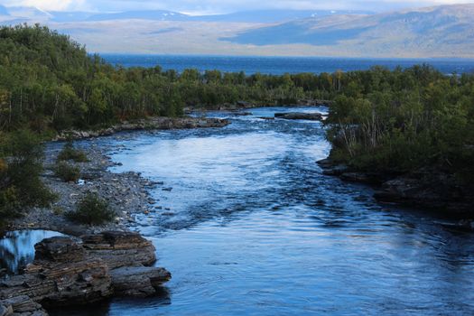 Overview of Kungsleden river in the arctic tundra. Abisko national park, Nothern Sweden