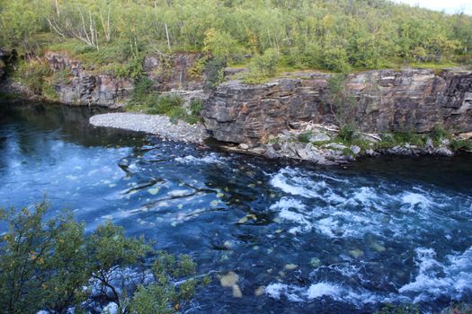 Overview of Kungsleden river in the arctic tundra. Abisko national park, Nothern Sweden