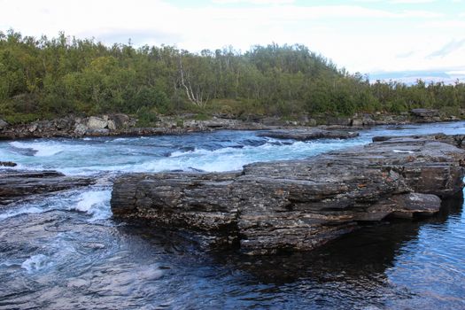 Overview of Kungsleden river in the arctic tundra. Abisko national park, Nothern Sweden