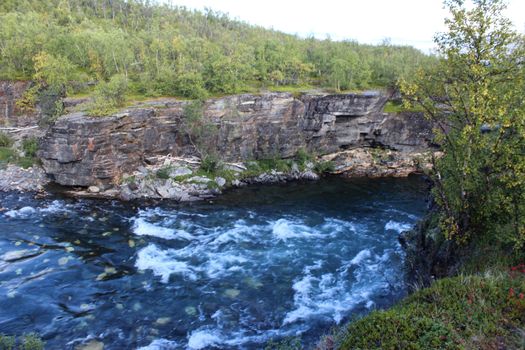 Overview of Kungsleden river in the arctic tundra. Abisko national park, Nothern Sweden