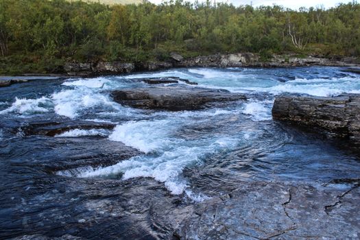 Overview of Kungsleden river in the arctic tundra. Abisko national park, Nothern Sweden