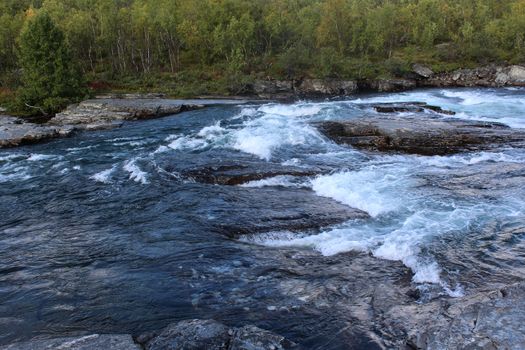 Overview of Kungsleden river in the arctic tundra. Abisko national park, Nothern Sweden