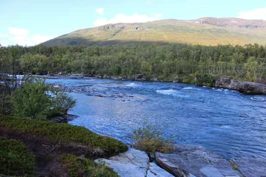 Overview of Kungsleden river in the arctic tundra. Abisko national park, Nothern Sweden