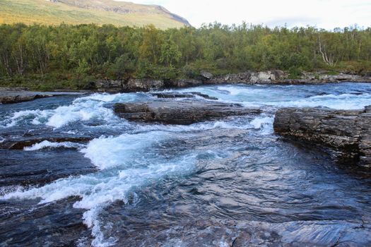 Overview of Kungsleden river in the arctic tundra. Abisko national park, Nothern Sweden