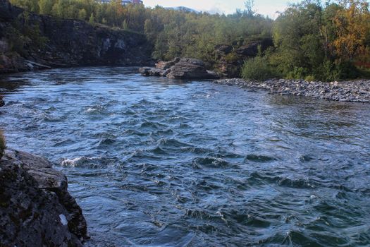 Overview of Kungsleden river in the arctic tundra. Abisko national park, Nothern Sweden
