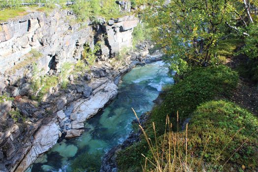 Overview of Kungsleden river in the arctic tundra. Abisko national park, Nothern Sweden