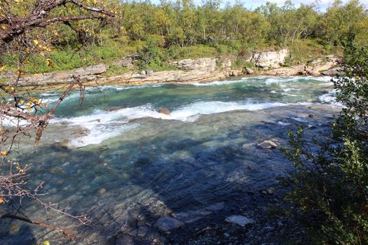 Overview of Kungsleden river in the arctic tundra. Abisko national park, Nothern Sweden