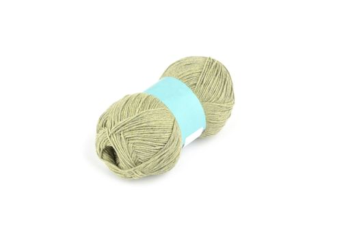 Tangle of color yarn with blank label on white background skein. Knitting isolated on white. Use for store