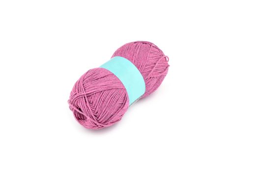 Tangle of color yarn with blank label on white background skein. Knitting isolated on white. Use for store