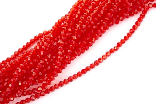 Beautiful Red Glass Sparkle Crystal Isoalted Beads on white background. Use for diy beaded jewelry