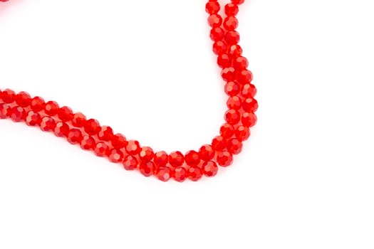 Beautiful Red Glass Sparkle Crystal Isoalted Beads on white background. Use for diy beaded jewelry