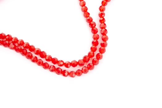 Beautiful Red Glass Sparkle Crystal Isoalted Beads on white background. Use for diy beaded jewelry