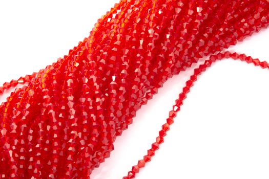 Beautiful Red Glass Sparkle Crystal Isoalted Beads on white background. Use for diy beaded jewelry