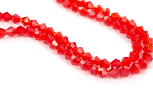 Beautiful Red Glass Sparkle Crystal Isoalted Beads on white background. Use for diy beaded jewelry