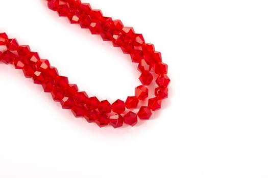 Beautiful Red Glass Sparkle Crystal Isoalted Beads on white background. Use for diy beaded jewelry