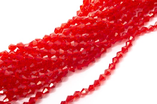 Beautiful Red Glass Sparkle Crystal Isoalted Beads on white background. Use for diy beaded jewelry