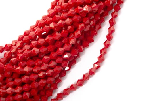 Beautiful Red Glass Sparkle Crystal Isoalted Beads on white background. Use for diy beaded jewelry