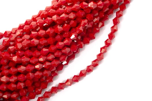 Beautiful Red Glass Sparkle Crystal Isoalted Beads on white background. Use for diy beaded jewelry