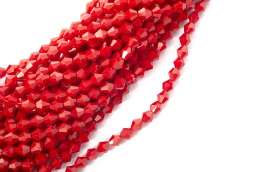 Beautiful Red Glass Sparkle Crystal Isoalted Beads on white background. Use for diy beaded jewelry