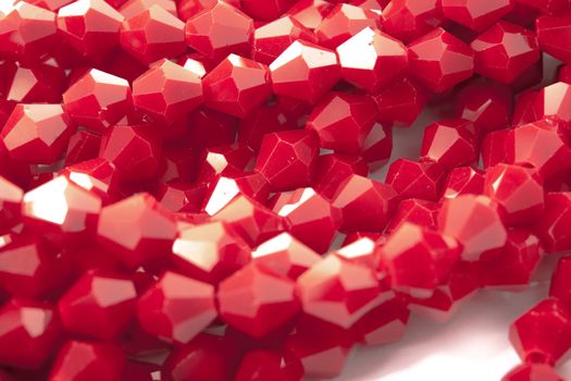 Beautiful Red Glass Sparkle Crystal Isoalted Beads on white background. Use for diy beaded jewelry