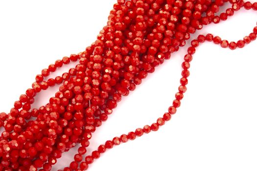 Beautiful Red Glass Sparkle Crystal Isoalted Beads on white background. Use for diy beaded jewelry