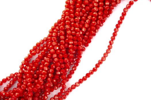 Beautiful Red Glass Sparkle Crystal Isoalted Beads on white background. Use for diy beaded jewelry
