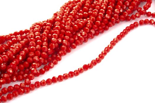 Beautiful Red Glass Sparkle Crystal Isoalted Beads on white background. Use for diy beaded jewelry