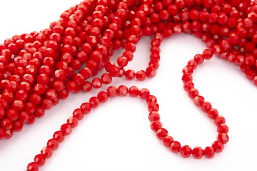 Beautiful Red Glass Sparkle Crystal Isoalted Beads on white background. Use for diy beaded jewelry
