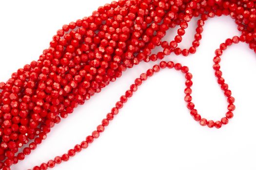 Beautiful Red Glass Sparkle Crystal Isoalted Beads on white background. Use for diy beaded jewelry