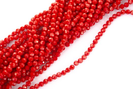 Beautiful Red Glass Sparkle Crystal Isoalted Beads on white background. Use for diy beaded jewelry