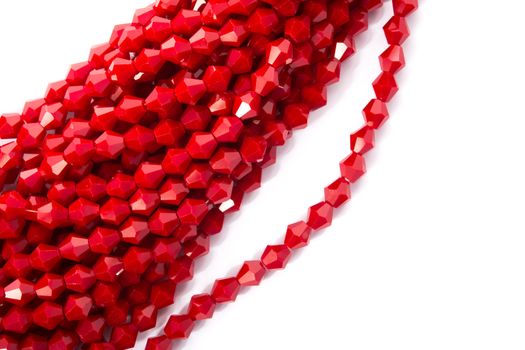 Beautiful Red Glass Sparkle Crystal Isoalted Beads on white background. Use for diy beaded jewelry