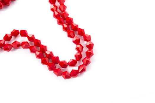 Beautiful Red Glass Sparkle Crystal Isoalted Beads on white background. Use for diy beaded jewelry