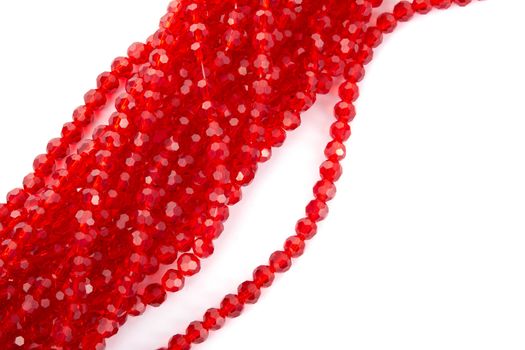 Beautiful Red Glass Sparkle Crystal Isoalted Beads on white background. Use for diy beaded jewelry