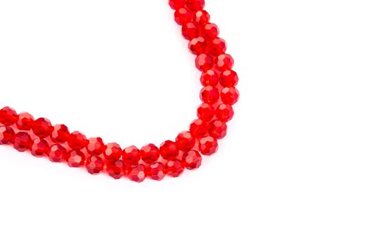 Beautiful Red Glass Sparkle Crystal Isoalted Beads on white background. Use for diy beaded jewelry