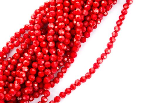 Beautiful Red Glass Sparkle Crystal Isoalted Beads on white background. Use for diy beaded jewelry