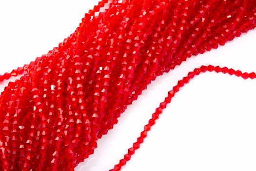 Beautiful Red Glass Sparkle Crystal Isoalted Beads on white background. Use for diy beaded jewelry