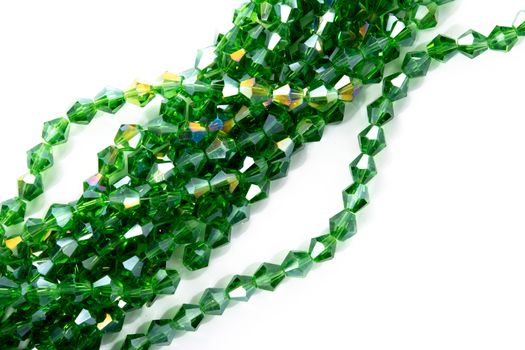 Beautiful Light green Glass Sparkle Crystal Isoalted Beads on white background. Use for diy beaded jewelry