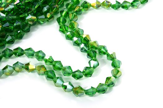 Beautiful Light green Glass Sparkle Crystal Isoalted Beads on white background. Use for diy beaded jewelry