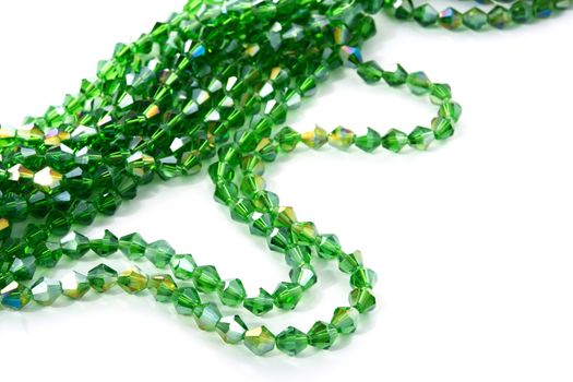 Beautiful Light green Glass Sparkle Crystal Isoalted Beads on white background. Use for diy beaded jewelry