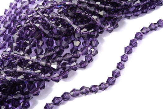 Beautiful Light purple Glass Sparkle Crystal Isoalted Beads on white background. Use for diy beaded jewelry