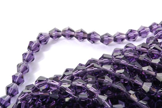 Beautiful Light purple Glass Sparkle Crystal Isoalted Beads on white background. Use for diy beaded jewelry