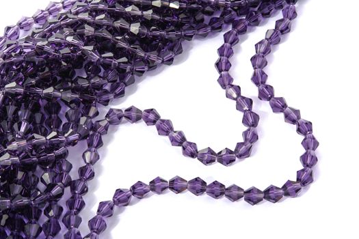 Beautiful Light purple Glass Sparkle Crystal Isoalted Beads on white background. Use for diy beaded jewelry