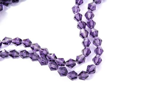 Beautiful Light purple Glass Sparkle Crystal Isoalted Beads on white background. Use for diy beaded jewelry