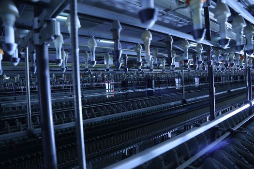Old machine inside textile factory