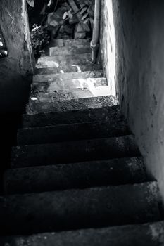 Vertical shot of stairs going downwards.