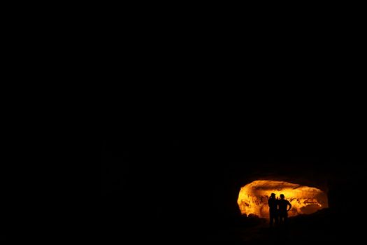 Silhouette of people on hill