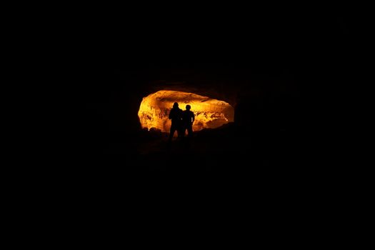 Silhouette of people on hill