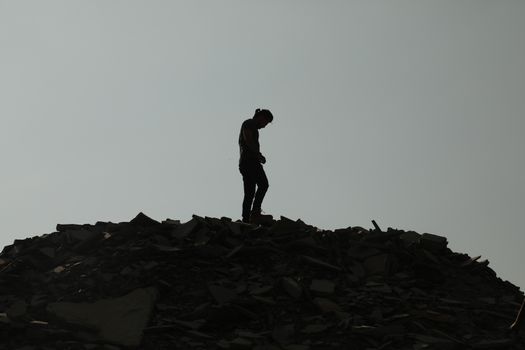 Silhouette of people on hill