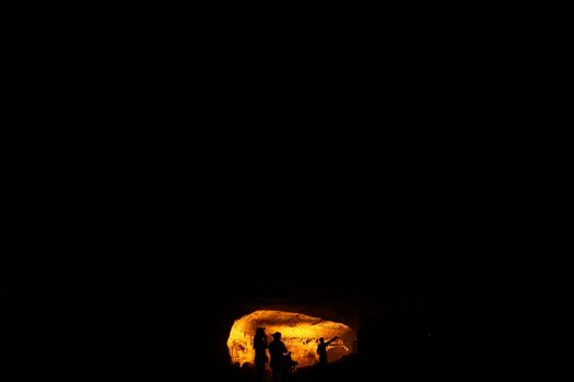 Silhouette of people on hill