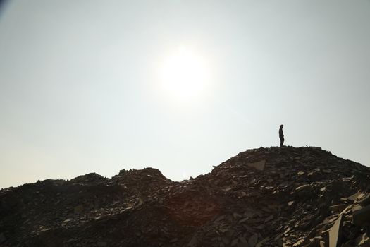 Silhouette of people on hill